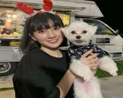 Wen has adopted a cute dog in her home.